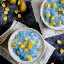 two bowls of Thai sticky rice pudding with corn