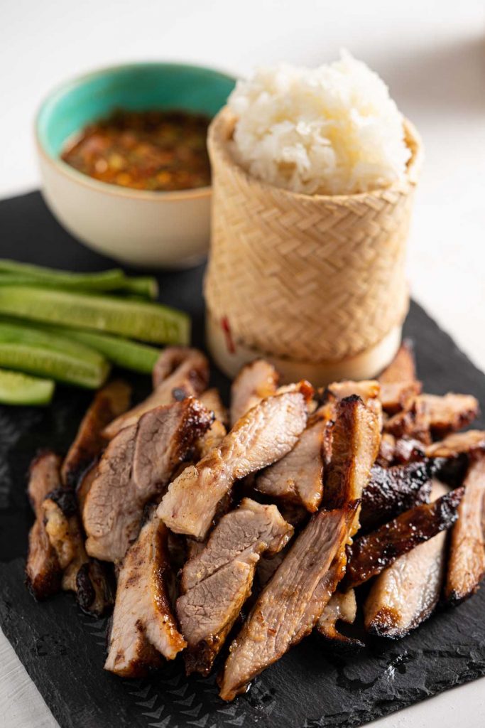 Thai grilled pork neck with Thai sticky rice, nam jim jaew and vegetables
