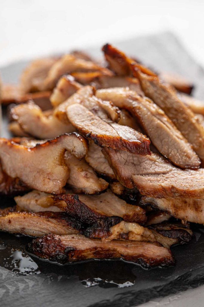 a pile of grilled pork neck