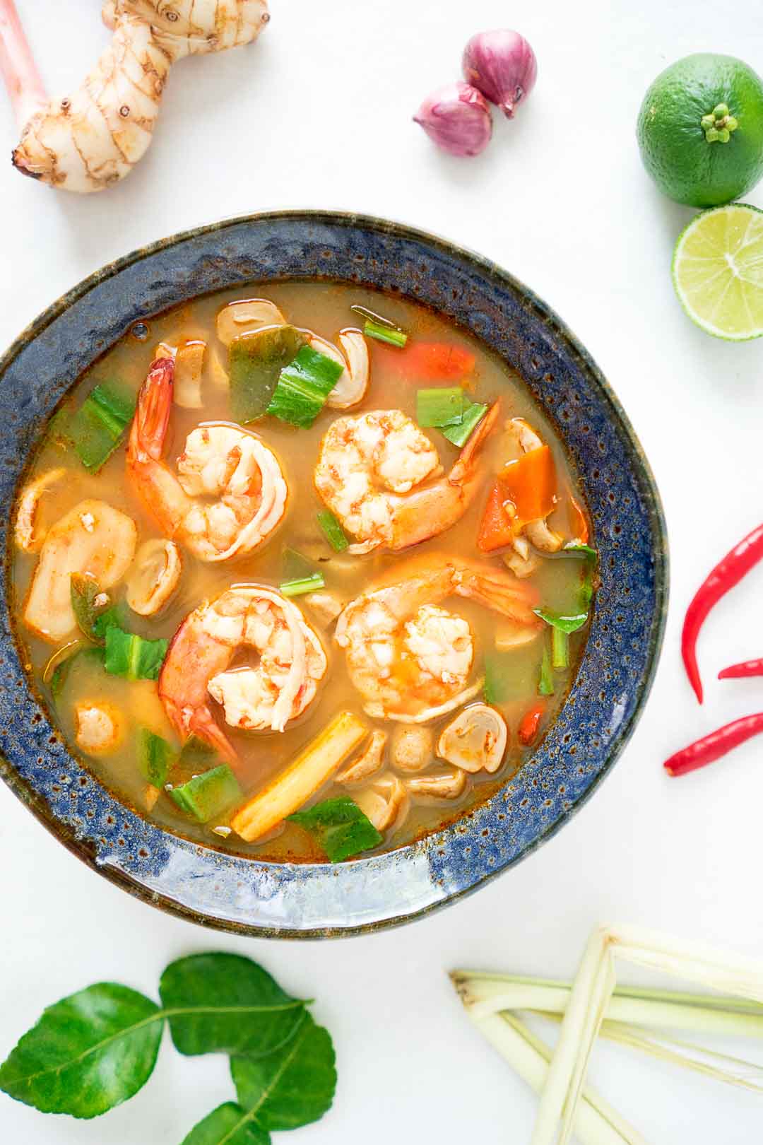 a bowl of tom yum goong or Thai lemongrass soup | tom yum gung | ต้มยำกุ้ง