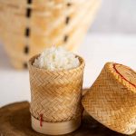 cooked Thai sticky rice in a bamboo basket