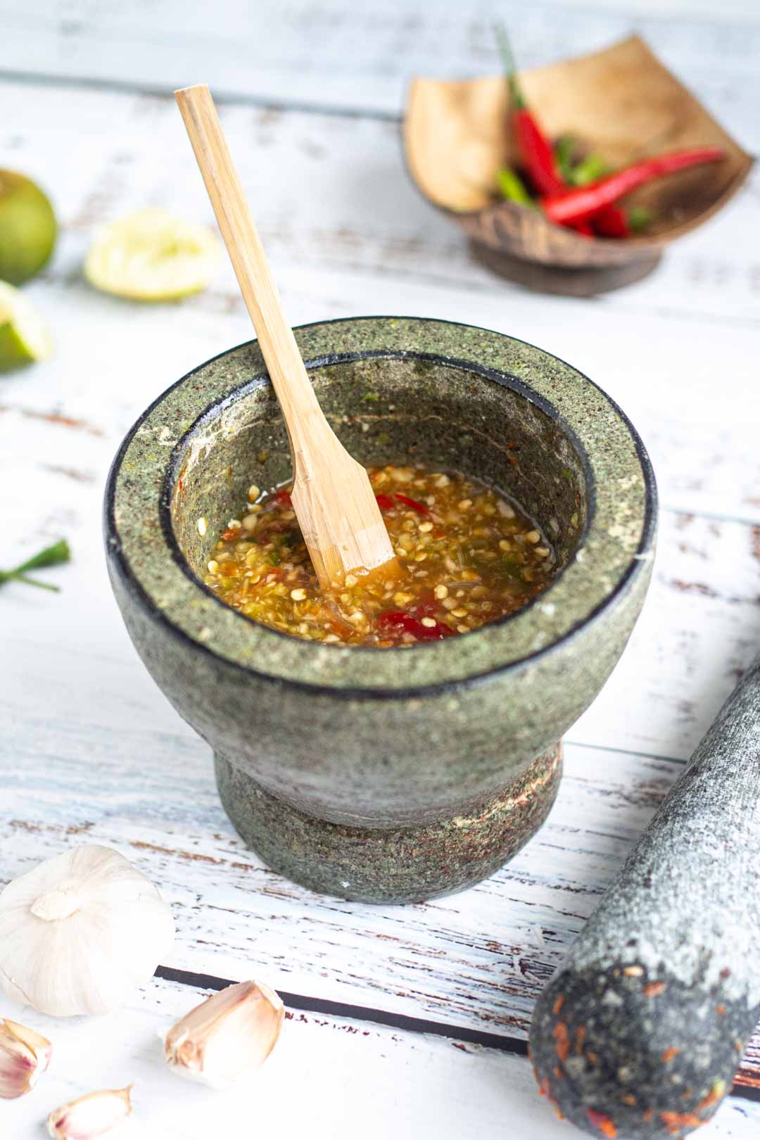 thai spicy and sour salad dressing in a mortar