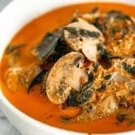 a bowl of vegan Thai red curry with mushrooms