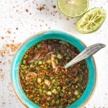 nam jim jaew Thai spicy dipping sauce in a turquoise bowl