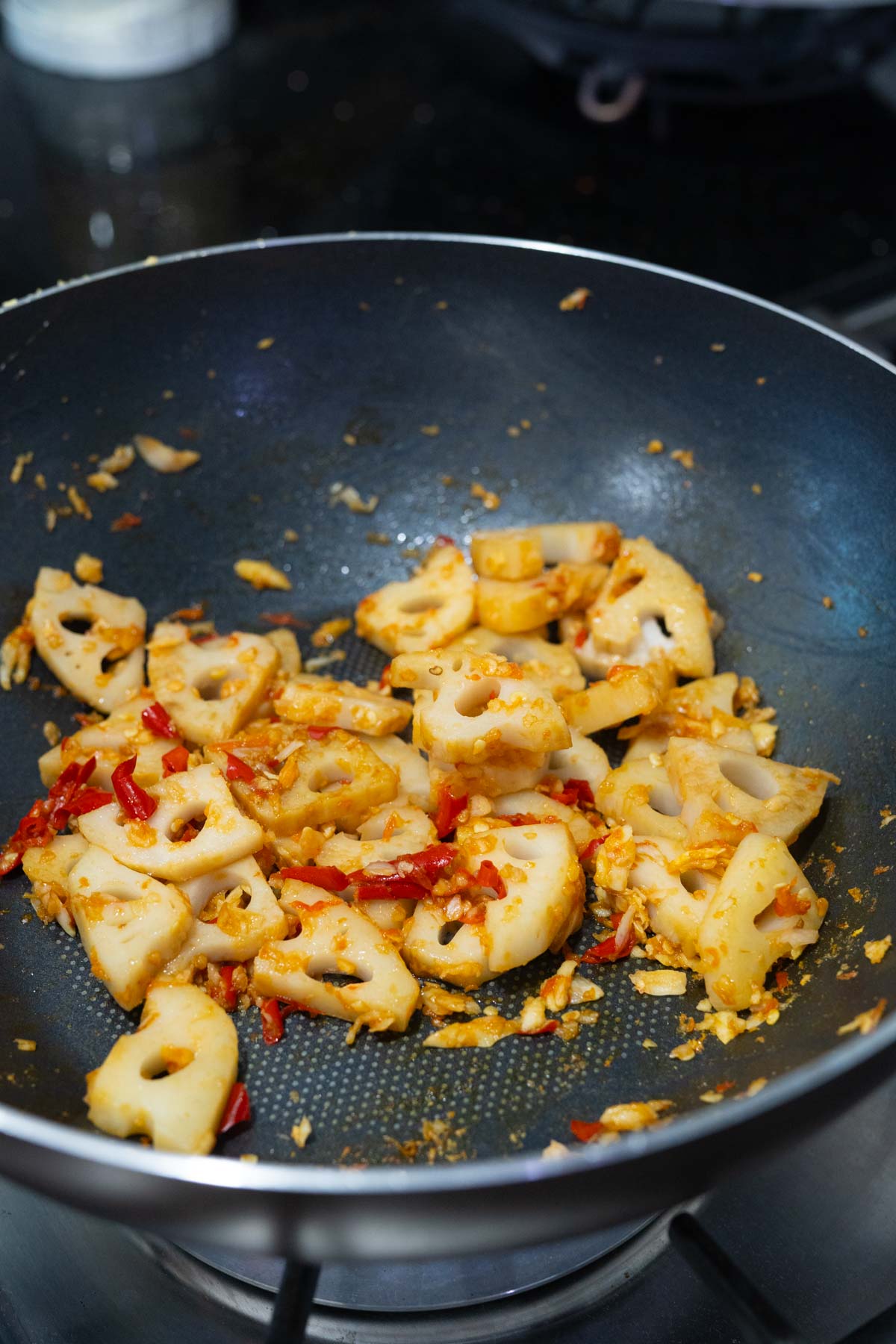 lotus root stir fry in a pan