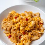 lotus root stir fry in a white dish